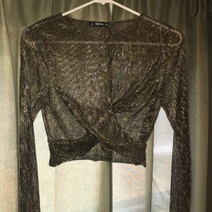 See through black and gold crop top